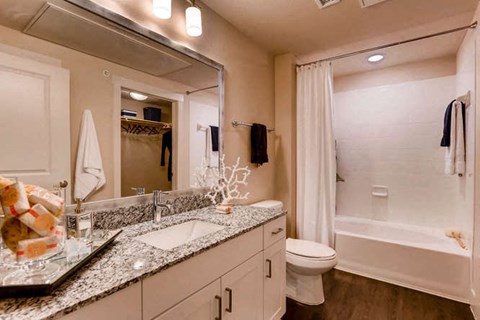 Bathrooms with Undermount Sinks and White Cabinetry at Touchstone Modern Apartment Homes, Broomfield, CO